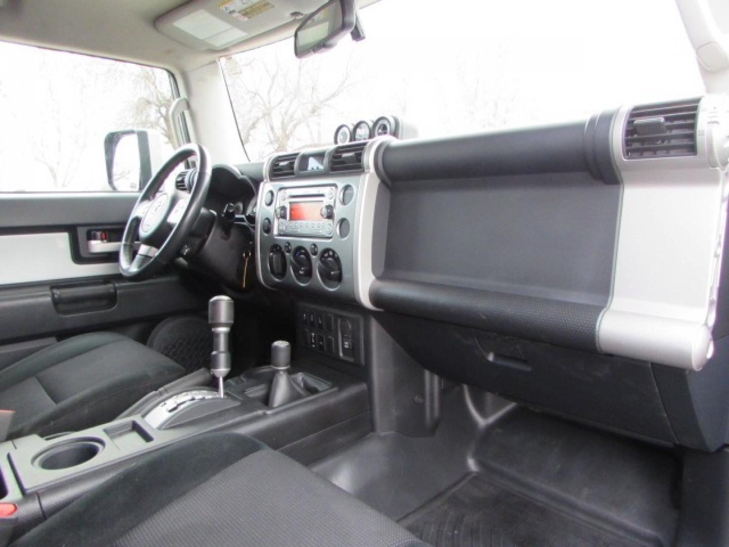 2012 Silver /Gray Toyota FJ Cruiser FJ Cruiser (JTEBU4BF1CK) with an 4.0L V6 engine, 5 speed automatic transmission, located at 4562 State Avenue, Billings, MT, 59101, (406) 896-9833, 45.769516, -108.526772 - Photo#16